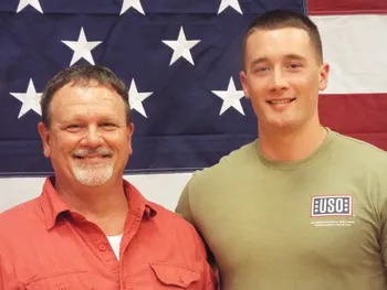 Two men smiling together