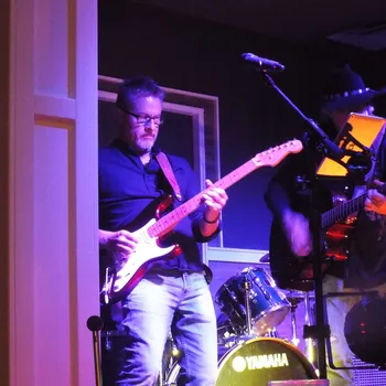 Guitarist performing on stage