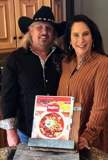 Couple posing in kitchen together